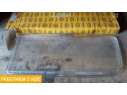 Стекло фары левое